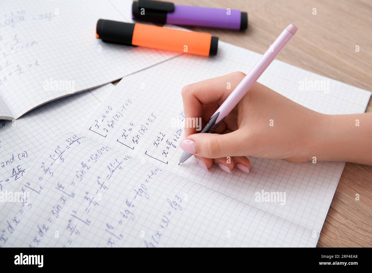 Person Writing Math Girl mathematical formulas hi-res stock photography and images - Alamy