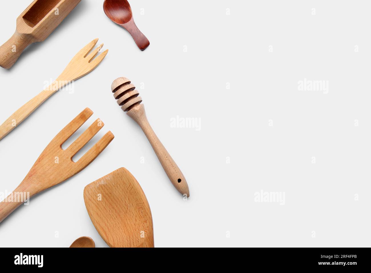 Set of different wooden kitchen utensils on white background Stock ...