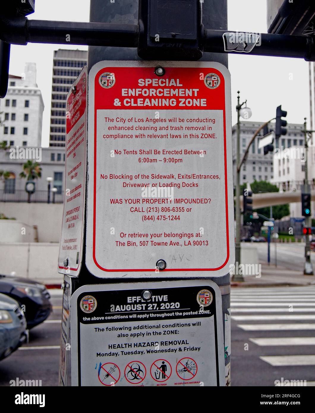 Special enforcement and  cleaning Zone sign that LA will be conuctiong enhanced cleaning and trash removal in this zone and No blocking of the side walk, exits/entrances, driveways or loading Docks, and Health Hazard removal, in Los Angeles, California, Stock Photo