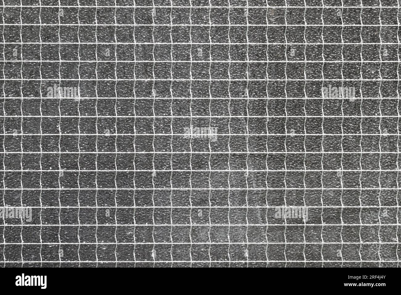 Mesh patterned texture of decorative old glass. Abstract geometric background Stock Photo