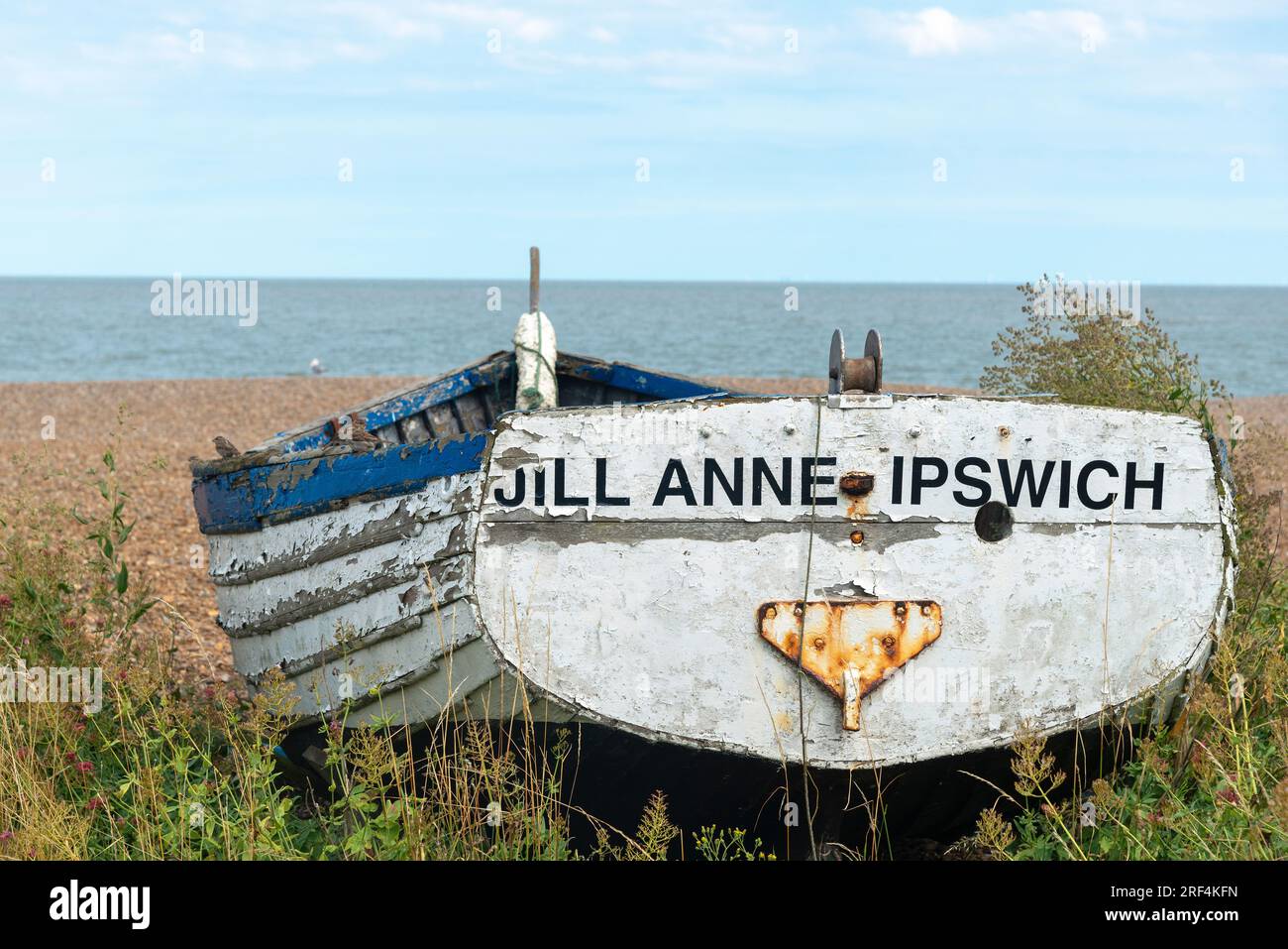 Fishing Boat Pulled Up On The Pebble Beach At Aldeburgh Suffolk