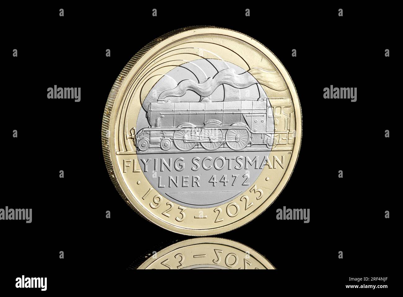 2023 bimetallic £2 coin to commemorate 100 years of the Flying Scotsman Steam Locomotive. The obverse shows the first portrait of King Charles III Stock Photo