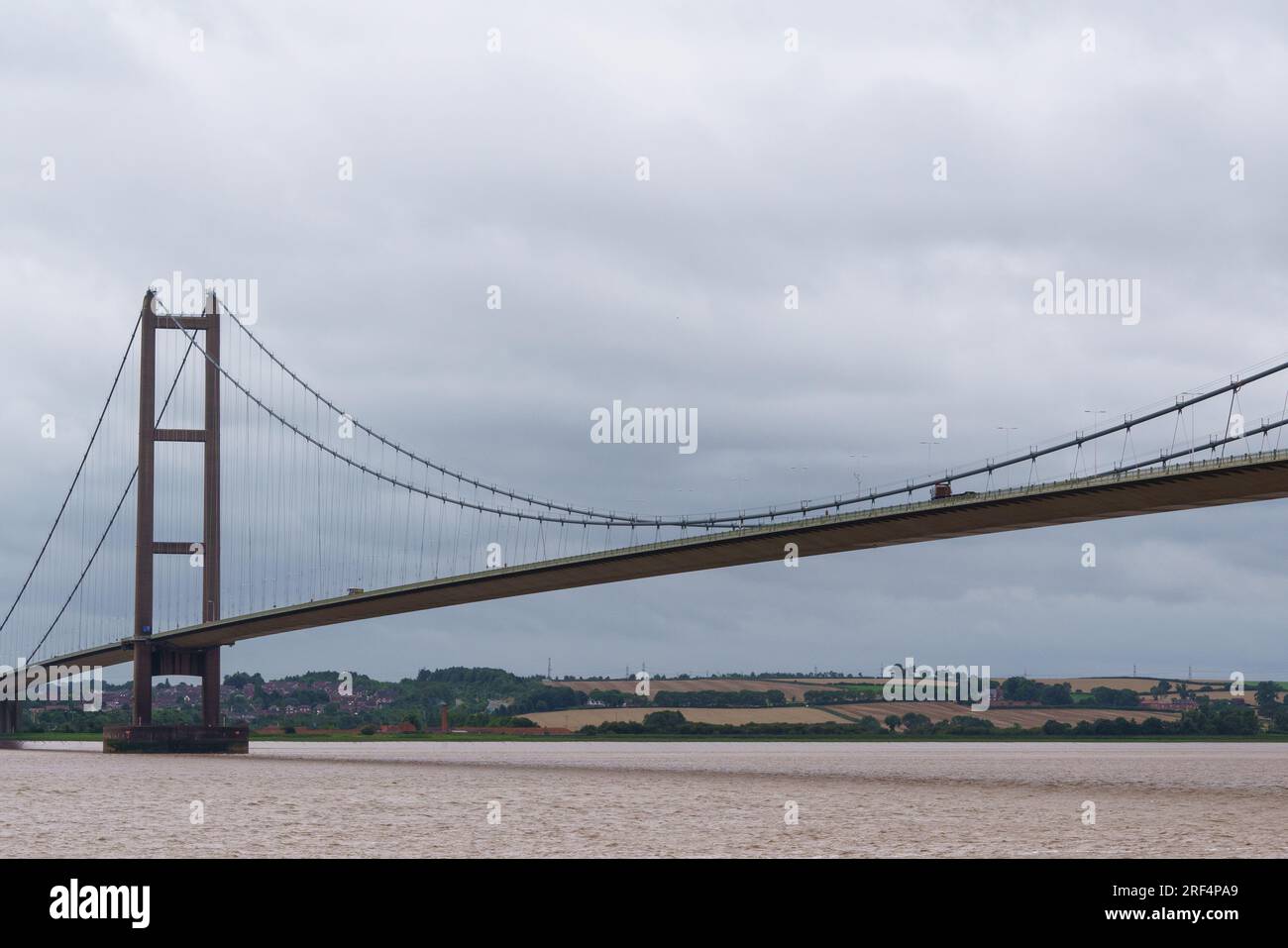 The Humber Bridge (East Yorkshire) on a gloomy windswept day, looking south towards Barton-on-Humber. World's 12th largest single span bridge. Stock Photo