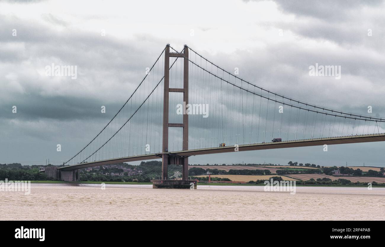 The Humber Bridge (East Yorkshire) on a gloomy windswept day, looking south towards Barton-on-Humber. World's 12th largest single span bridge. Stock Photo