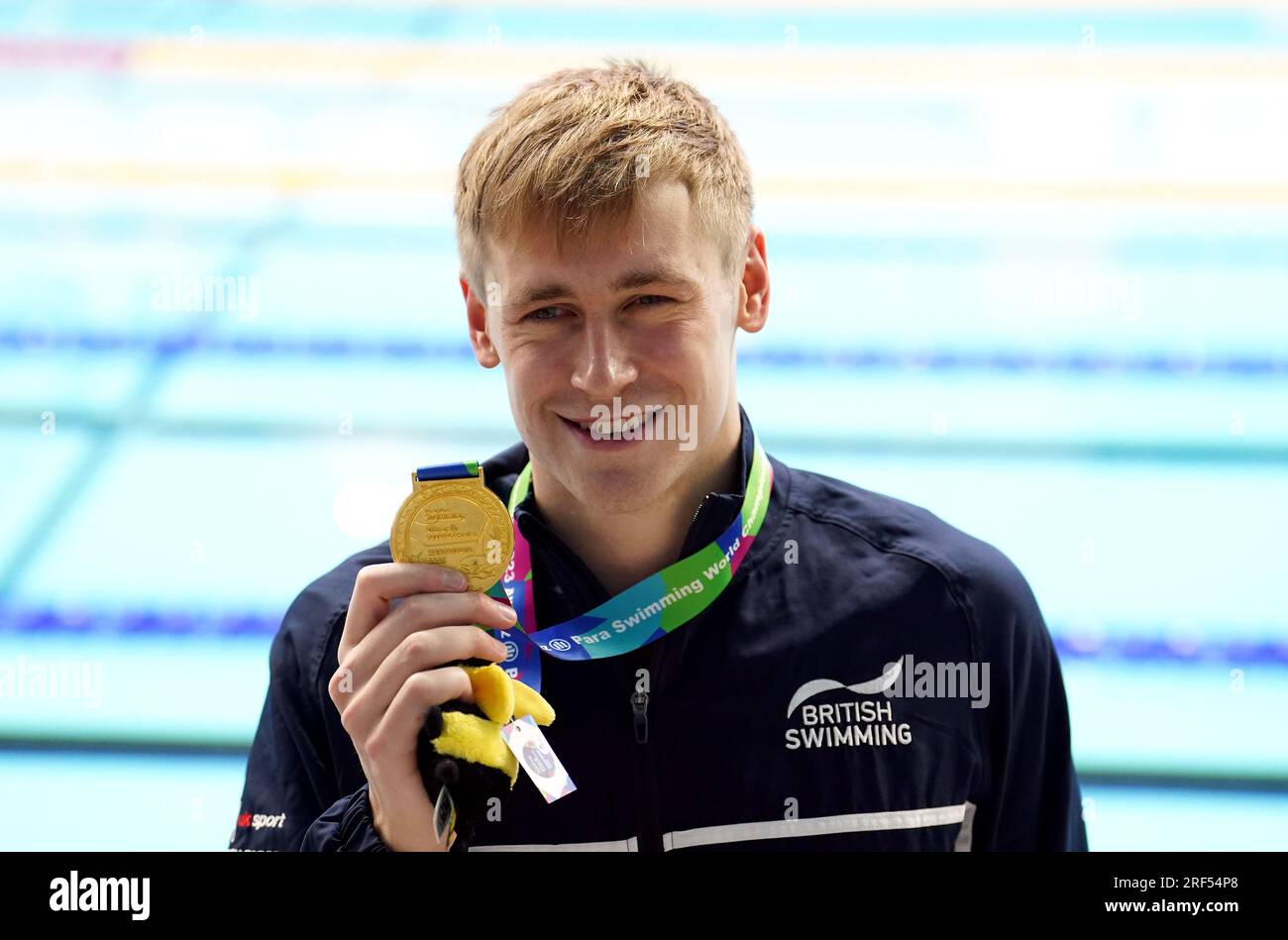 Great Britain’s Stephen Clegg with their gold medal for the Men's 100m Backstroke S12 on day one