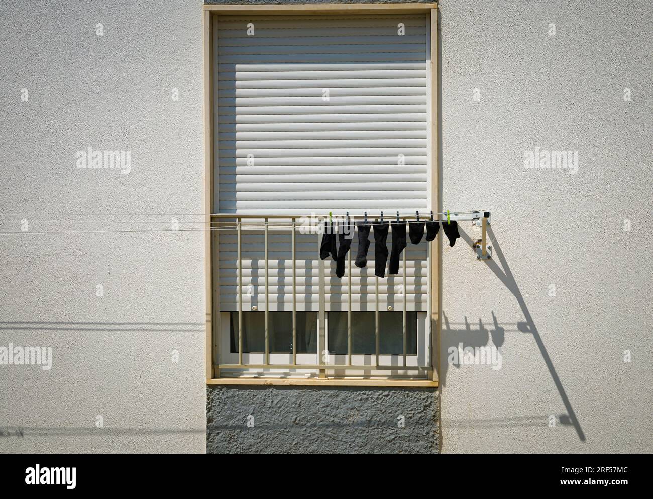socks hanging from a washing line Stock Photo Alamy