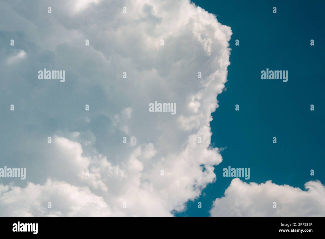 Low angle view of cloud in the sky Stock Photo - Alamy