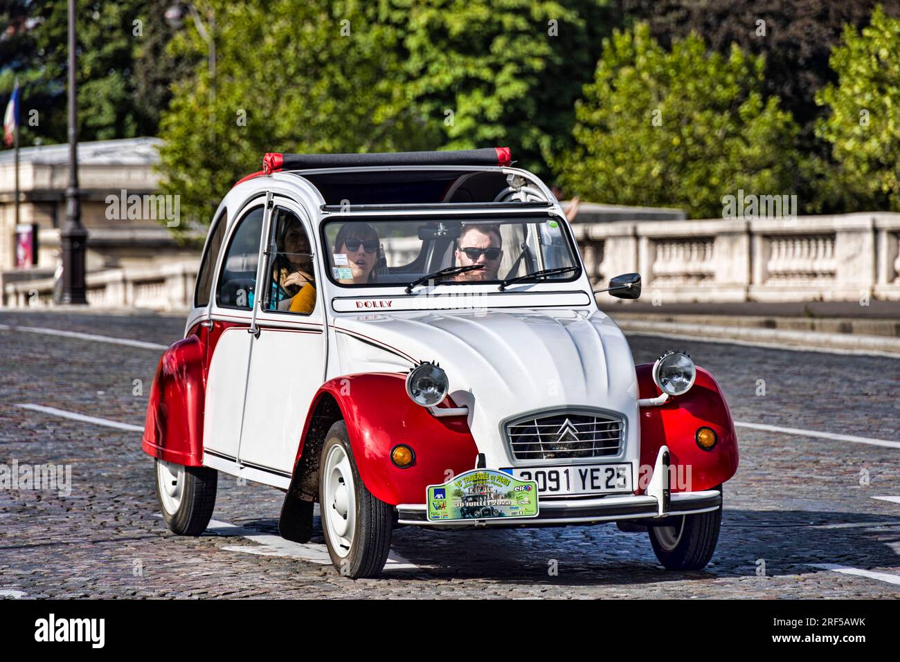 Paris, France. 30th July, 2023. Citroen 2CV presented at the 16th summer crossing of Paris in vintage vehicle on July 30, 2023. Stock Photo