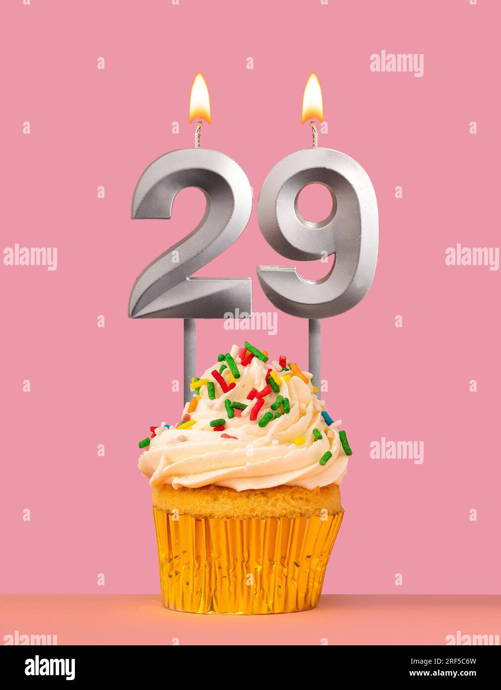 Birthday card with cupcake and candle number 29 Stock Photo