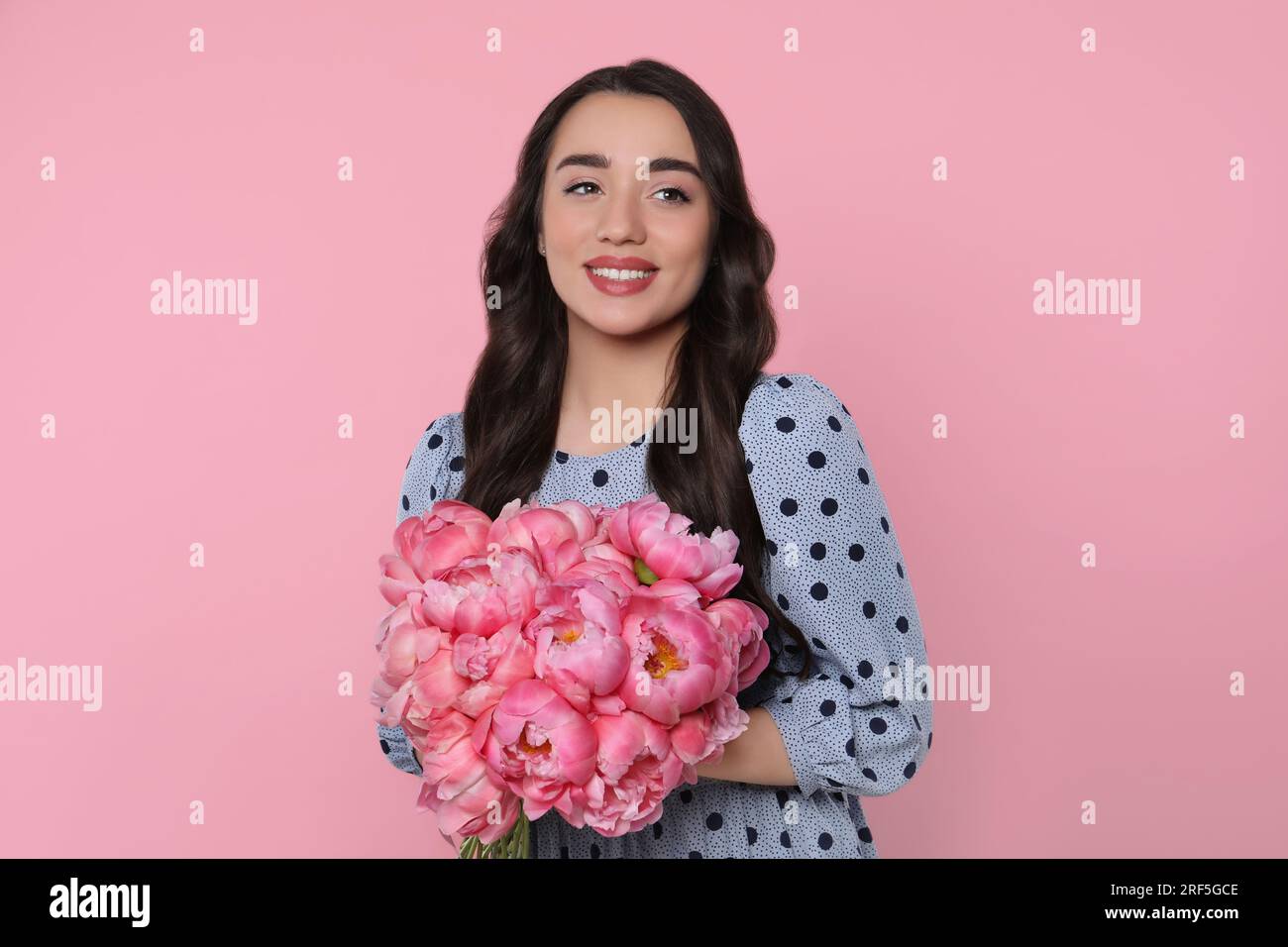 Woman with bouquet of peonies hi-res stock photography and images - Alamy