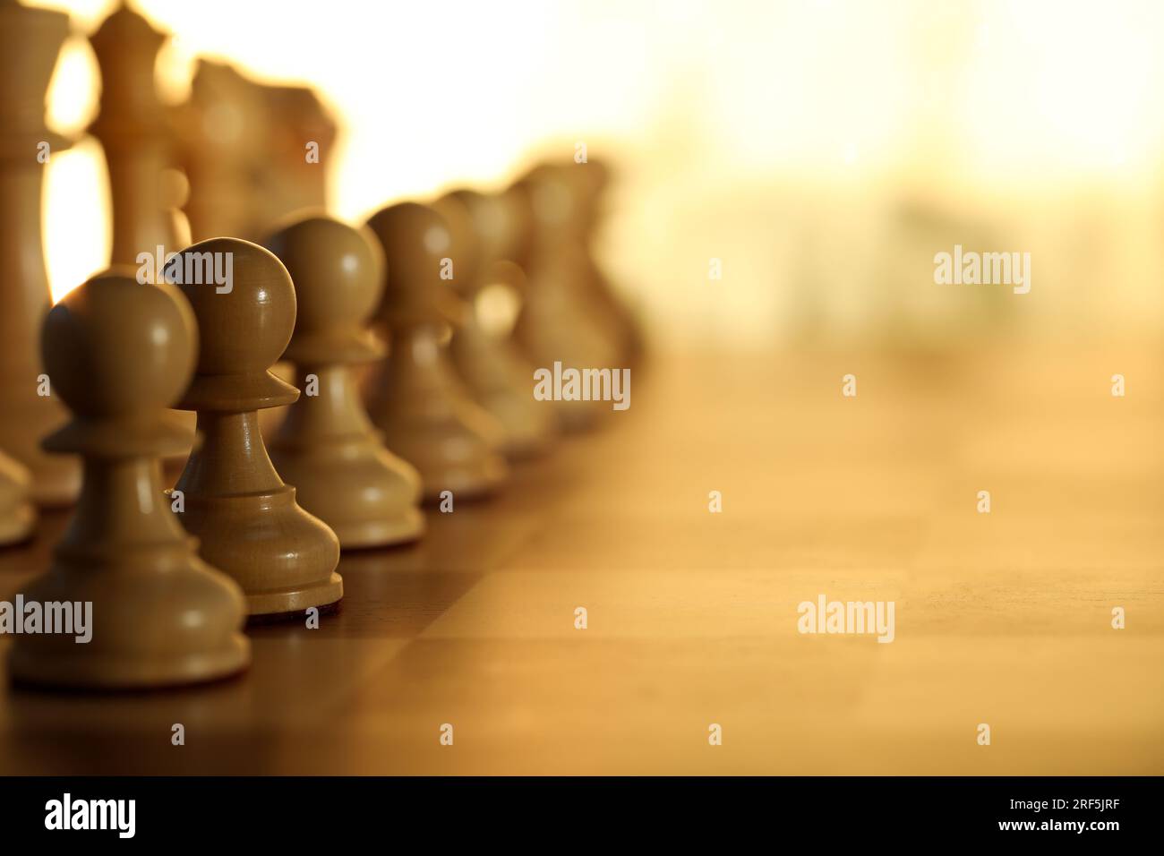 Chess pieces on a chessboard - Focus on the King Stock Photo - Alamy