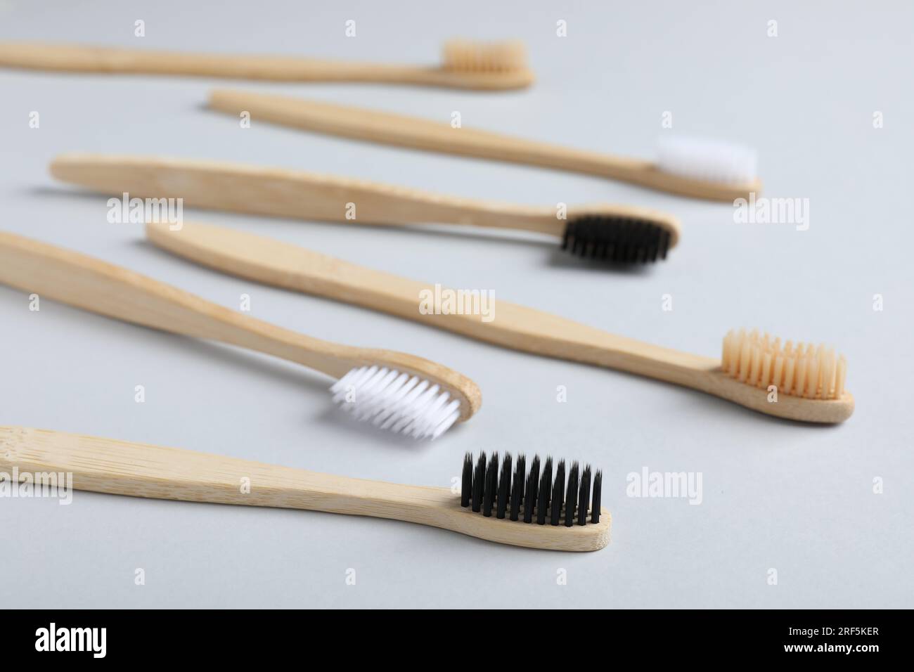 Many different bamboo toothbrushes on white background Stock Photo - Alamy