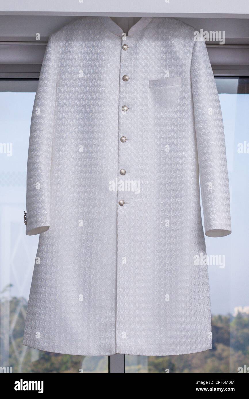 Wedding Couple beautiful accessories details Groom Wedding Attire In