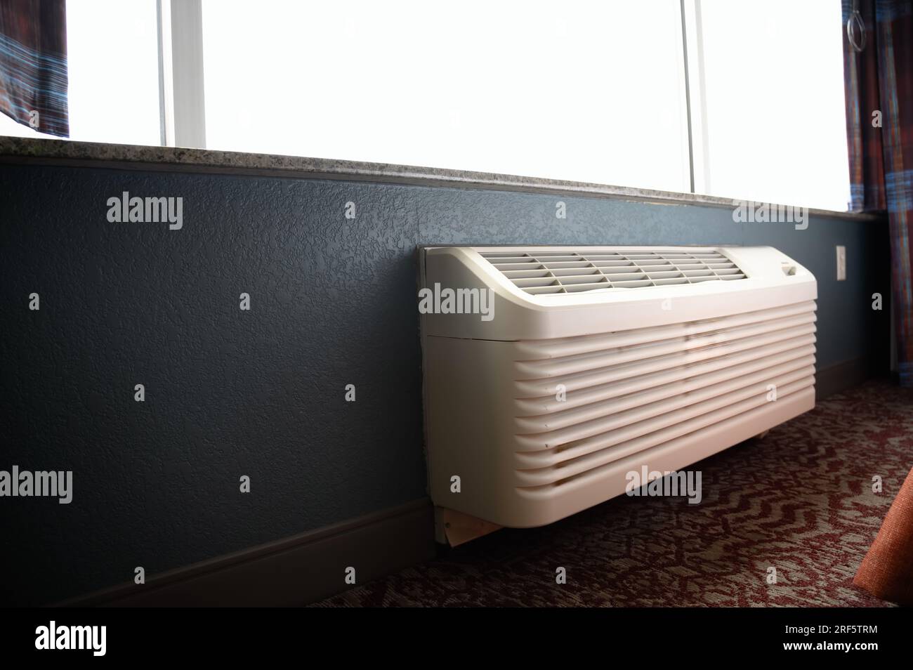 Wall mounted air conditioner unit in a room Stock Photo Alamy