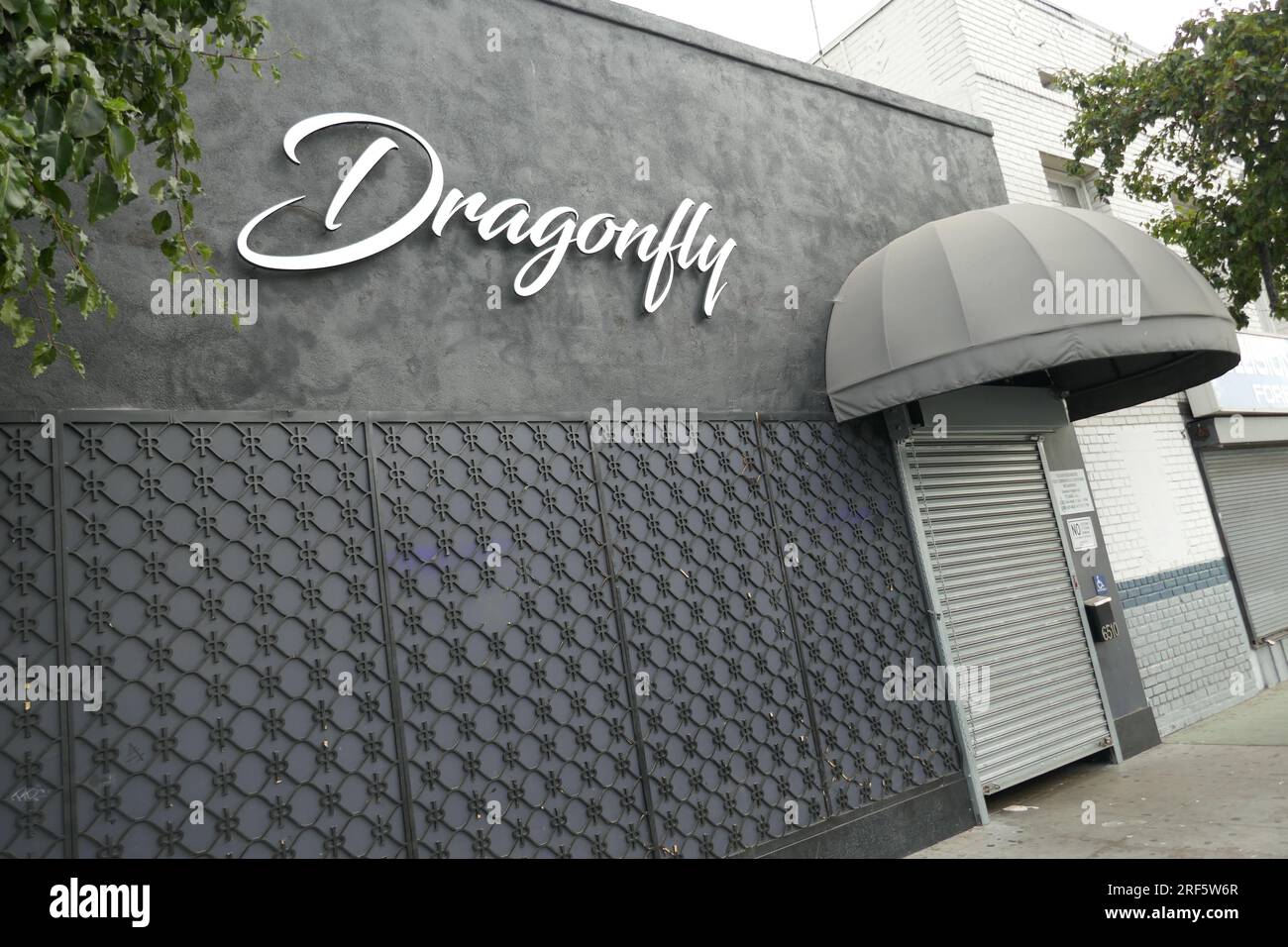 Los Angeles, California, USA 31st July 2023 Dragonfly Nightclub at 6510 Santa Monica Blvd where Security Guard Daniel Dee Sandifer was murdered by 11 people on July 30, 2023 shown here on July 31, 2023 in Los Angeles, California, USA. The Club has hosted Tyga, 2 Chains, Migos, Meghan Thee Stallion and Wiz Khalifa. Photo by Barry King/Alamy Live News Stock Photo