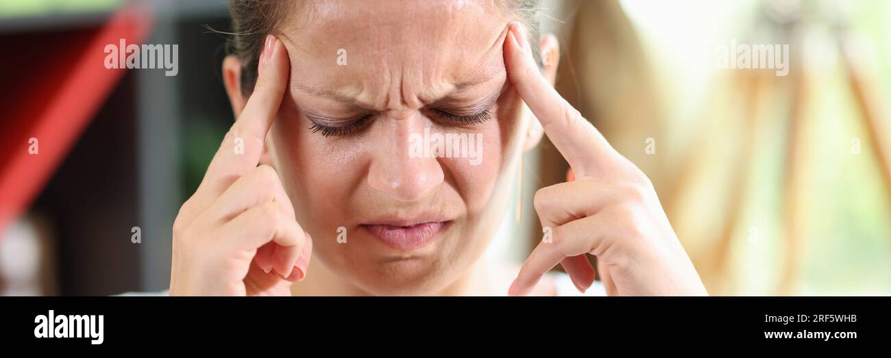 Businesswoman holding temples hi-res stock photography and images - Alamy