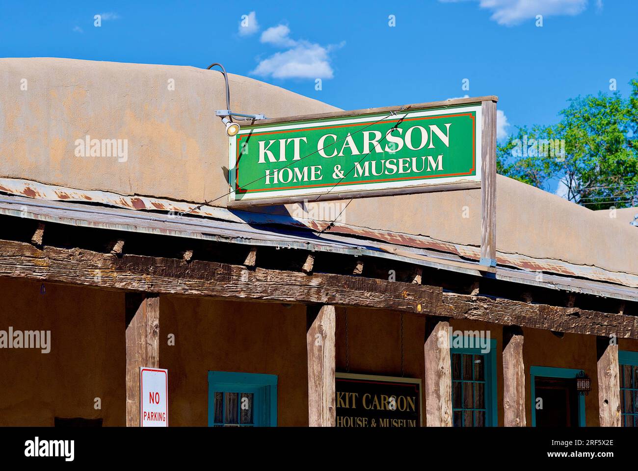 Taos, New Mexico, USA - July 23, 2023: Close-up of the sign for the historic 'Kit Carson Home & Museum' in downtown Taos, where the famous man lived. Stock Photo