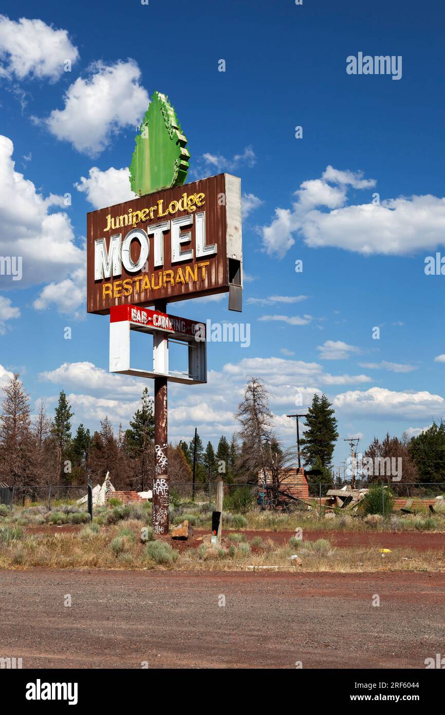 The neon sign is all that remains of the Juniper Lodge Motel along US 97 near the town of Macdoel, California. The abandoned motel burned during the T Stock Photo