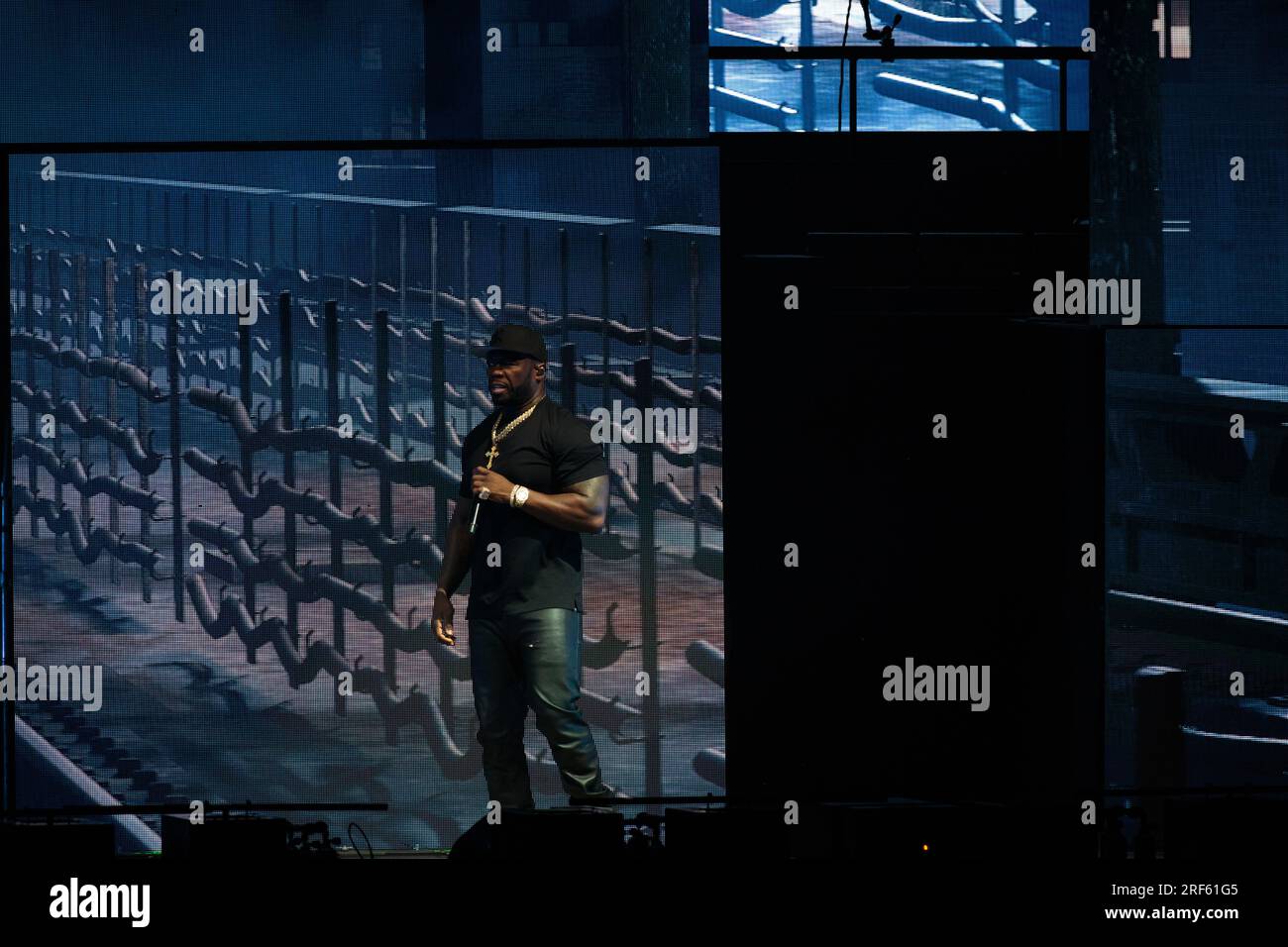 Toronto, Canada. 31st July, 2023. 50 Cent perfoms on stage wearing a black t-shirt, black leather pants and a black baseball cap Credit: Bobby Singh/Alamy Live News Stock Photo