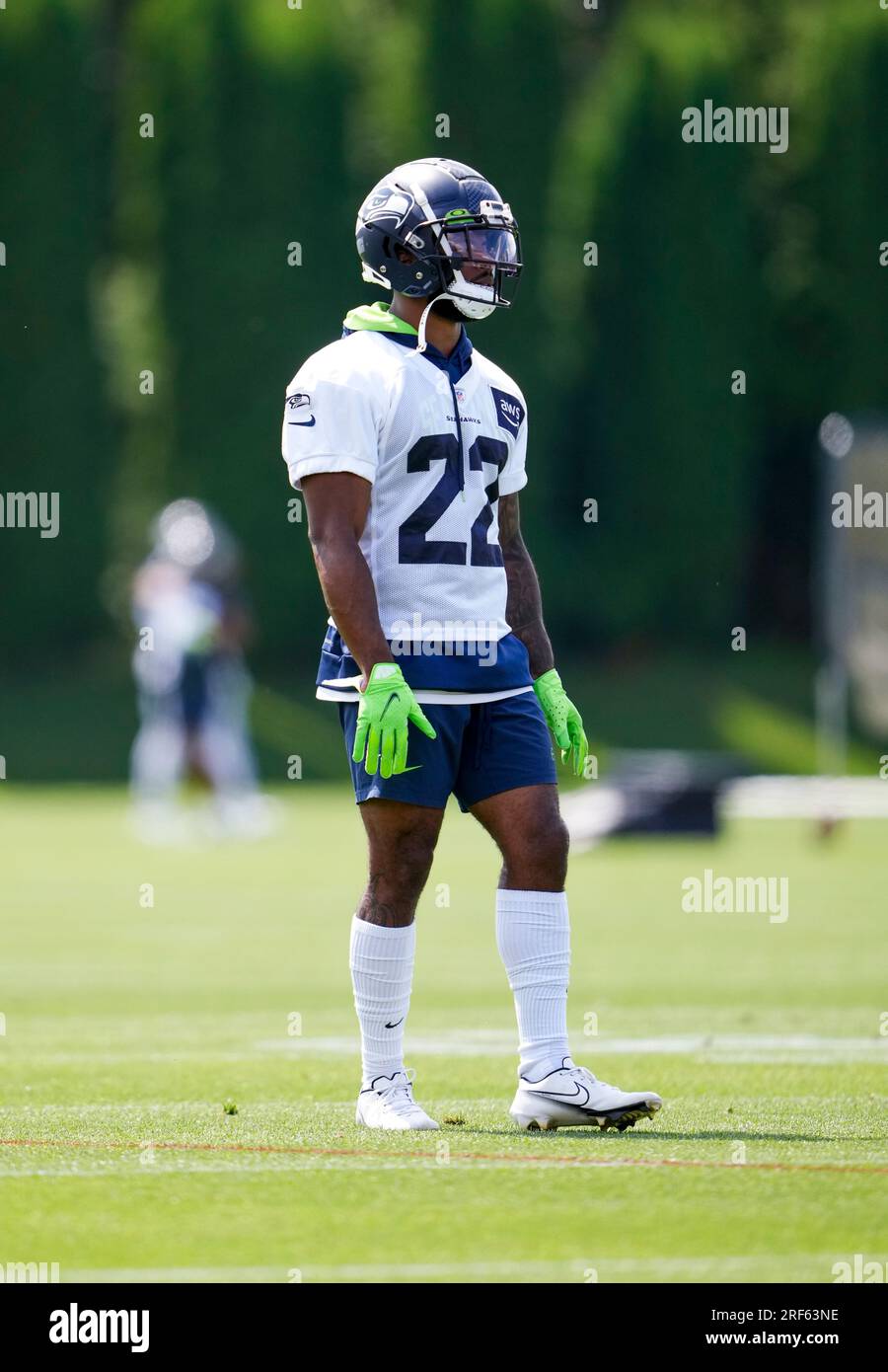 Seattle Seahawks cornerback Tre Brown (22) looks on during a 'Back Together  Weekend' event at the NFL football team's training facility, Sunday, July  30, 2023, in Renton, Wash. (AP Photo/Lindsey Wasson Stock