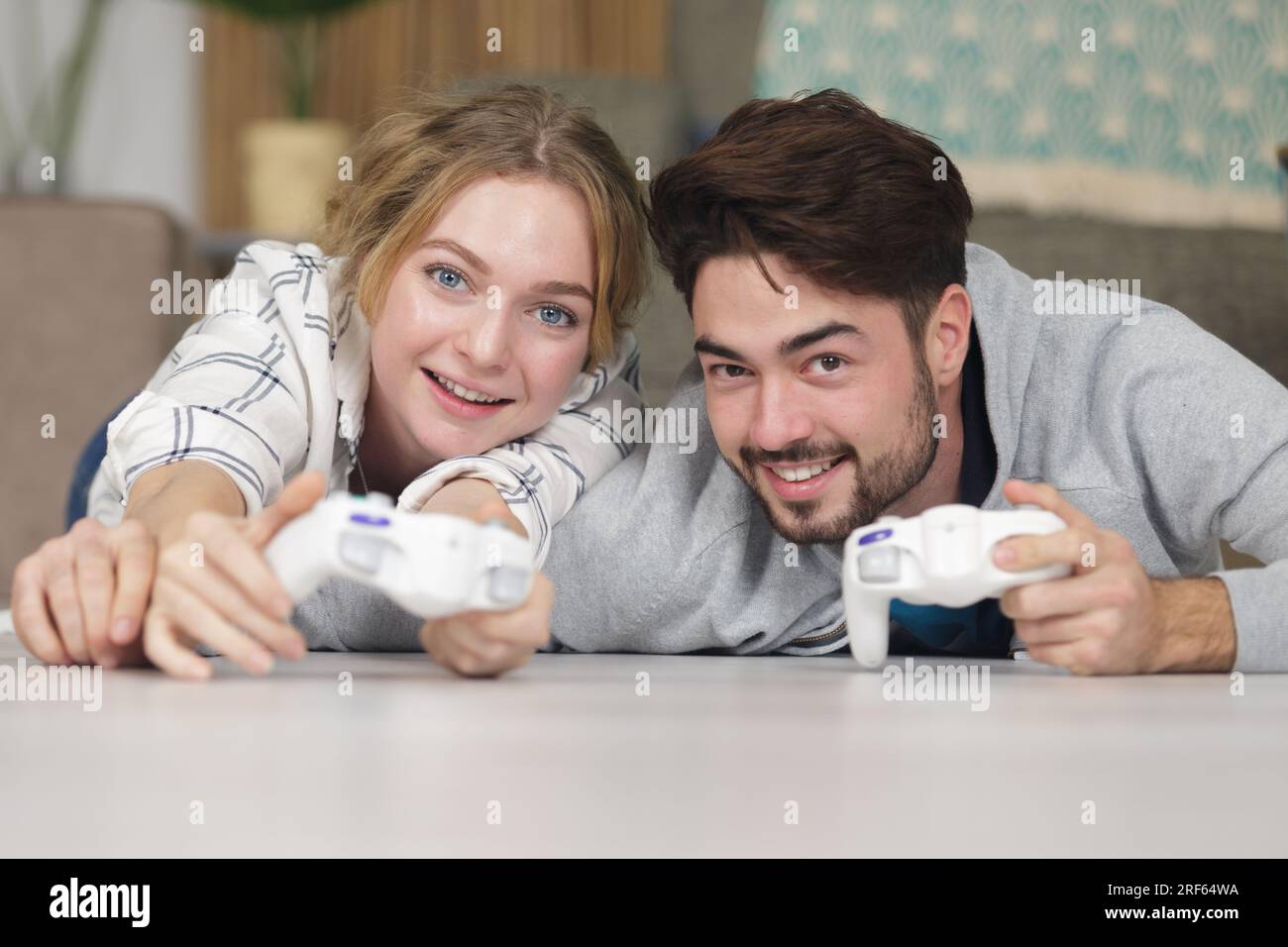 young couple playing video games Stock Photo