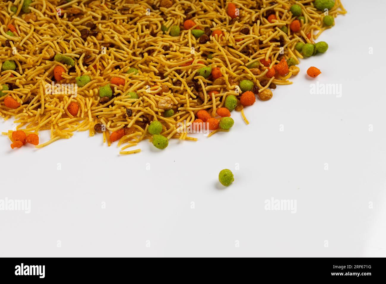 MIXTURE , commonly known as "Chivda" or "Namkeen," is a popular and delicious savoury snack in India, a mixture of various crunchy and flavourful Stock Photo