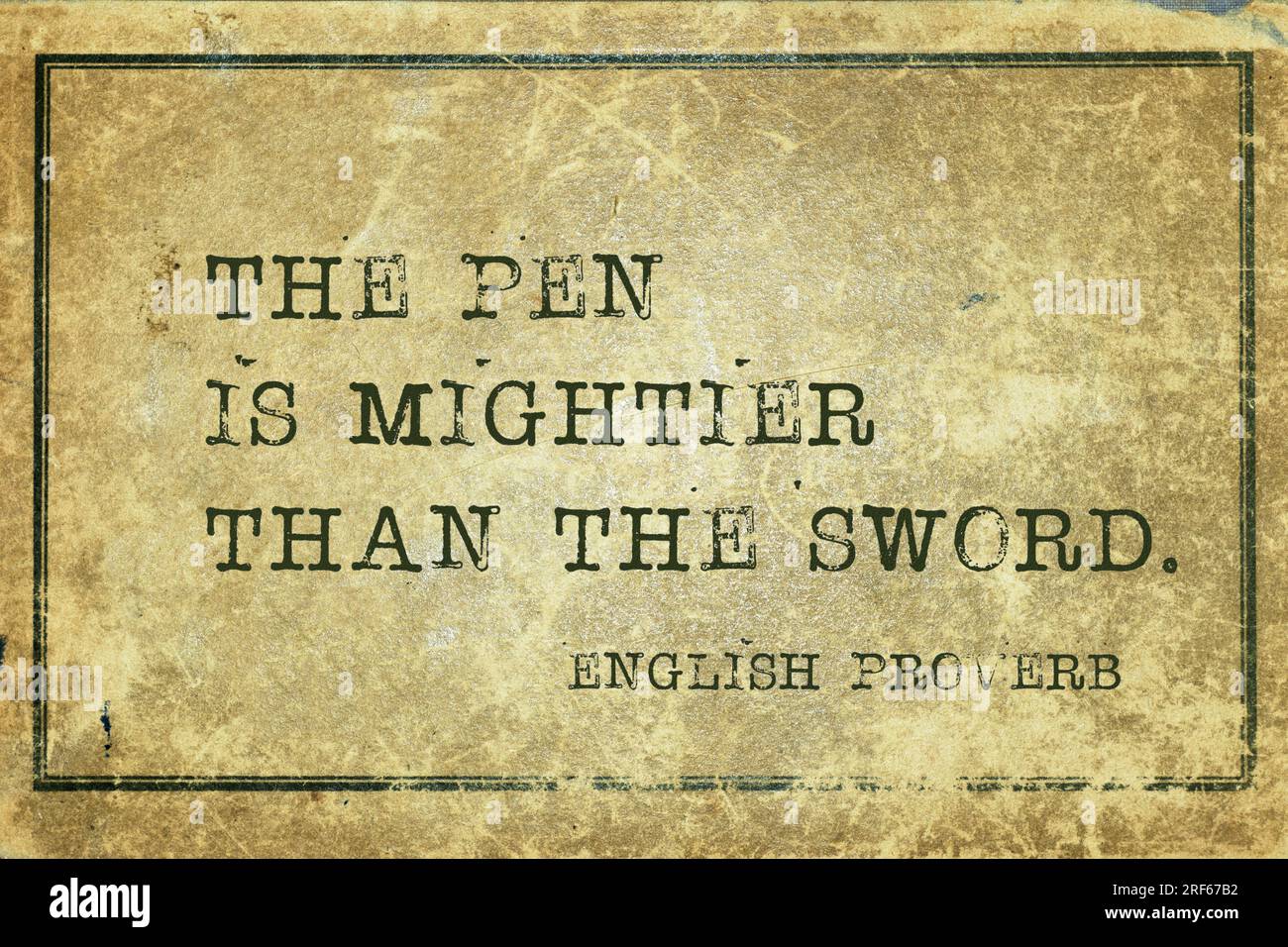 The pen is mightier than the sword ancient English proverb printed on grunge vintage cardboard