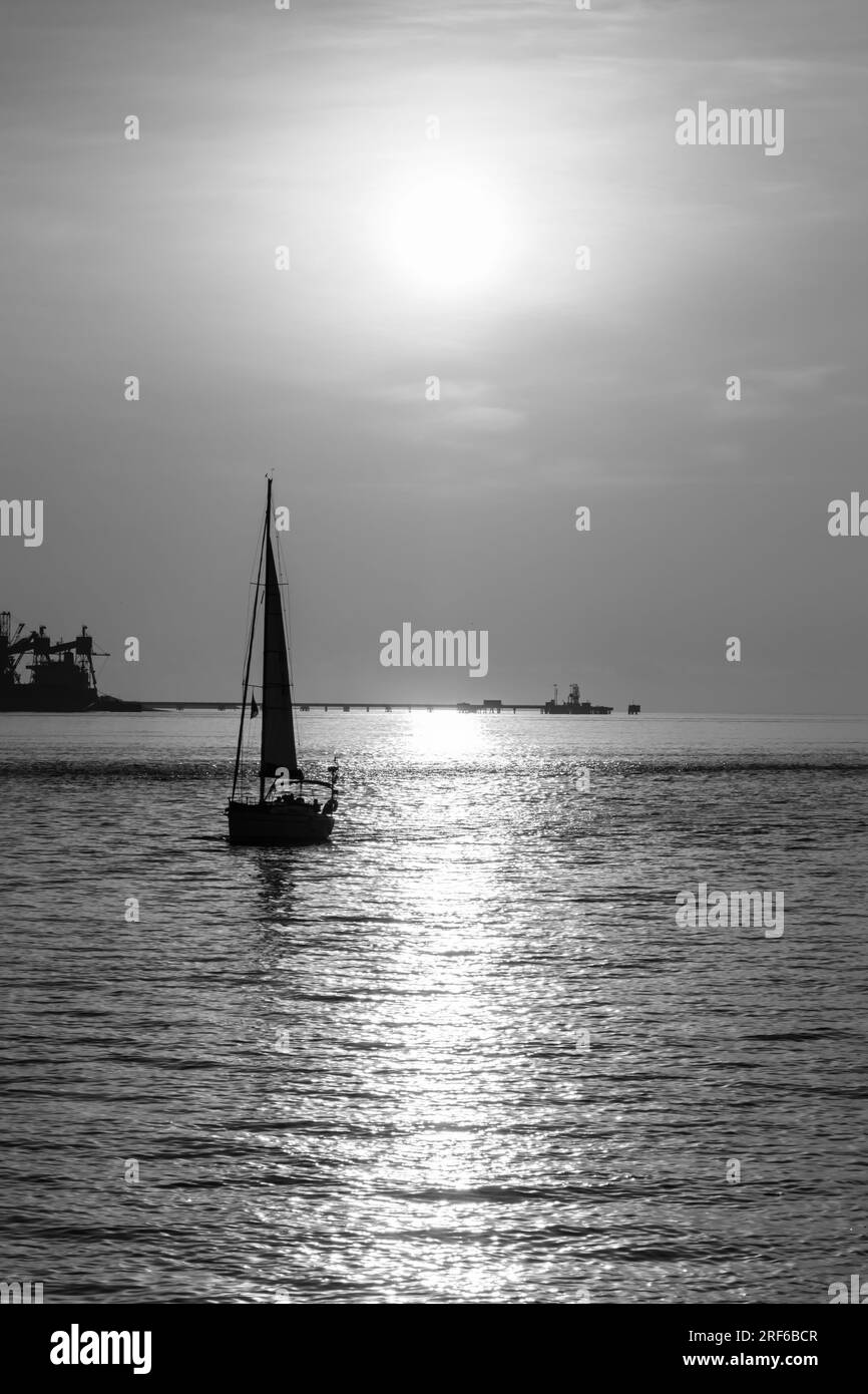 Fisherman in boat sailing Black and White Stock Photos & Images - Alamy