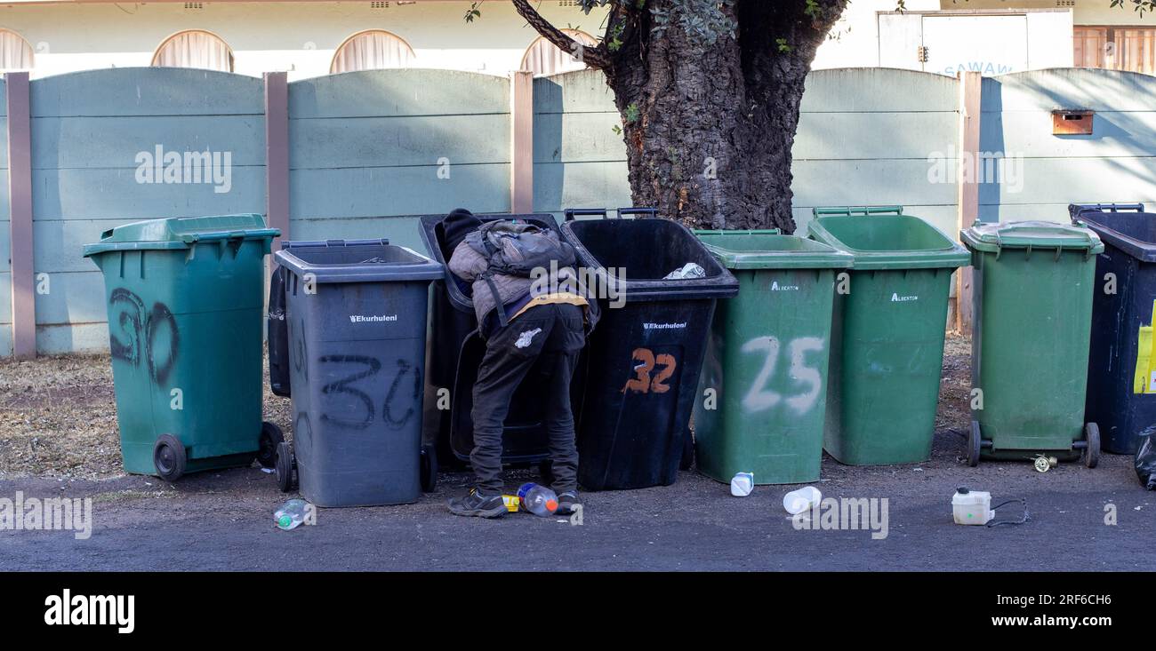 Johannesburg, South Africa an unidentified black man digs in