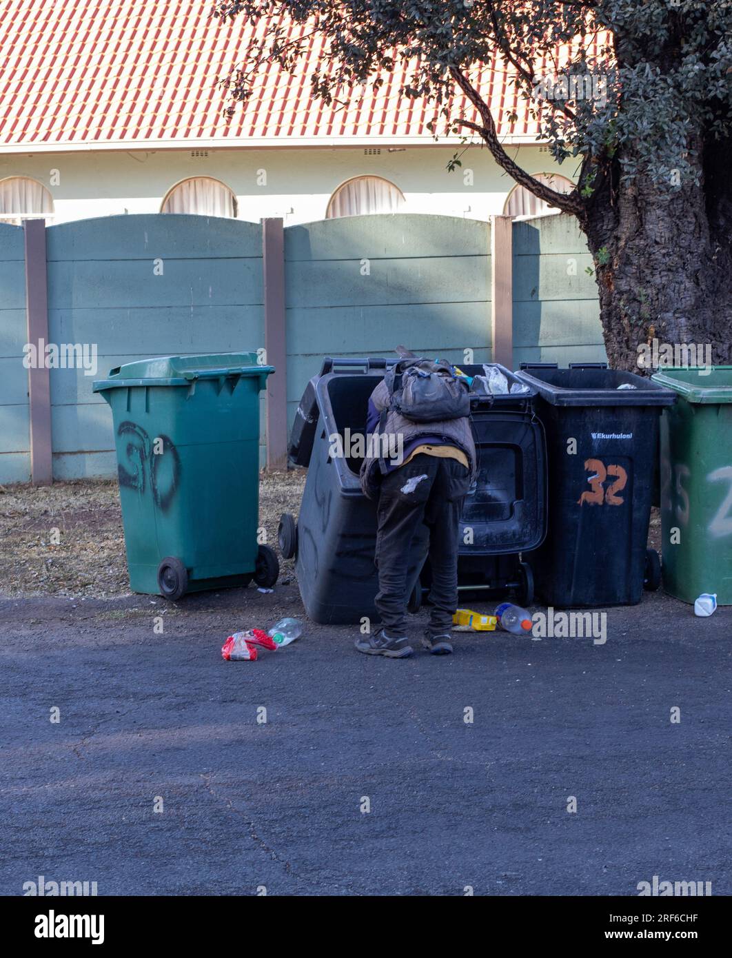 Johannesburg, South Africa an unidentified black man digs in