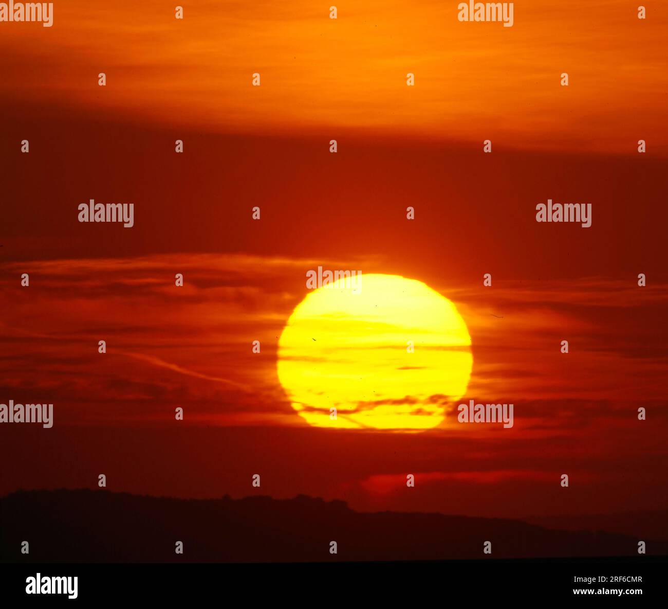 Sunset in the evening sky, cloudy atmosphere Stock Photo