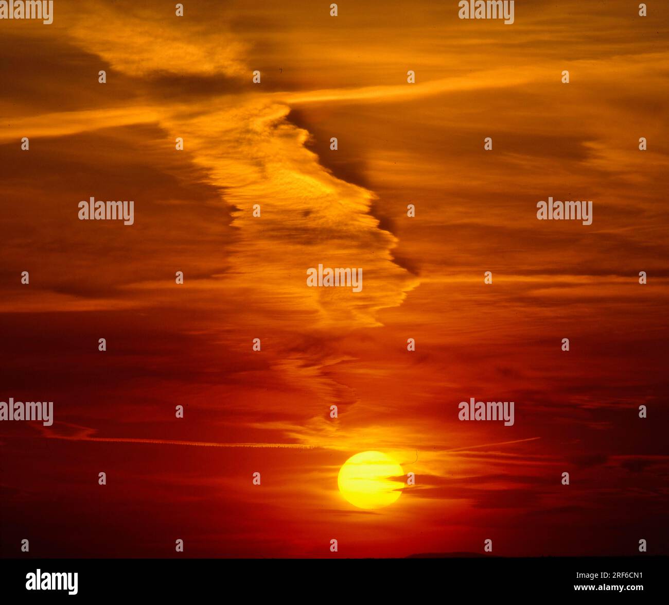 Sunset in the evening sky, cloudy atmosphere Stock Photo