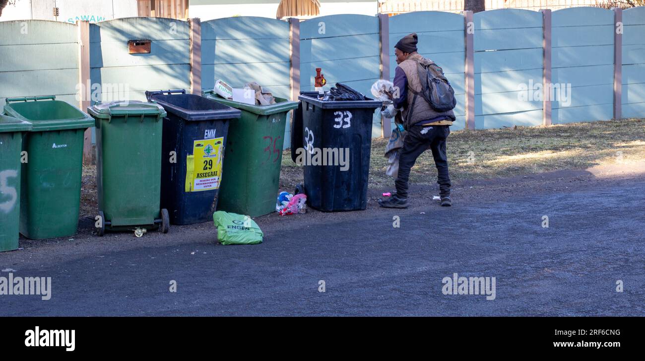 Johannesburg, South Africa an unidentified black man digs in