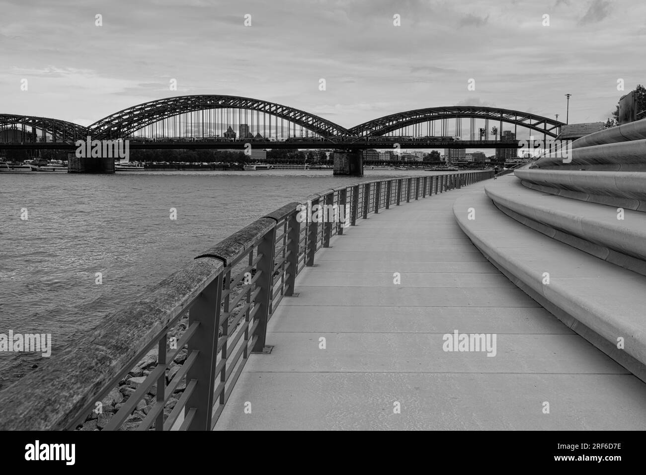 View over the Rhine promenade with bridge behind, Cologne, Germany