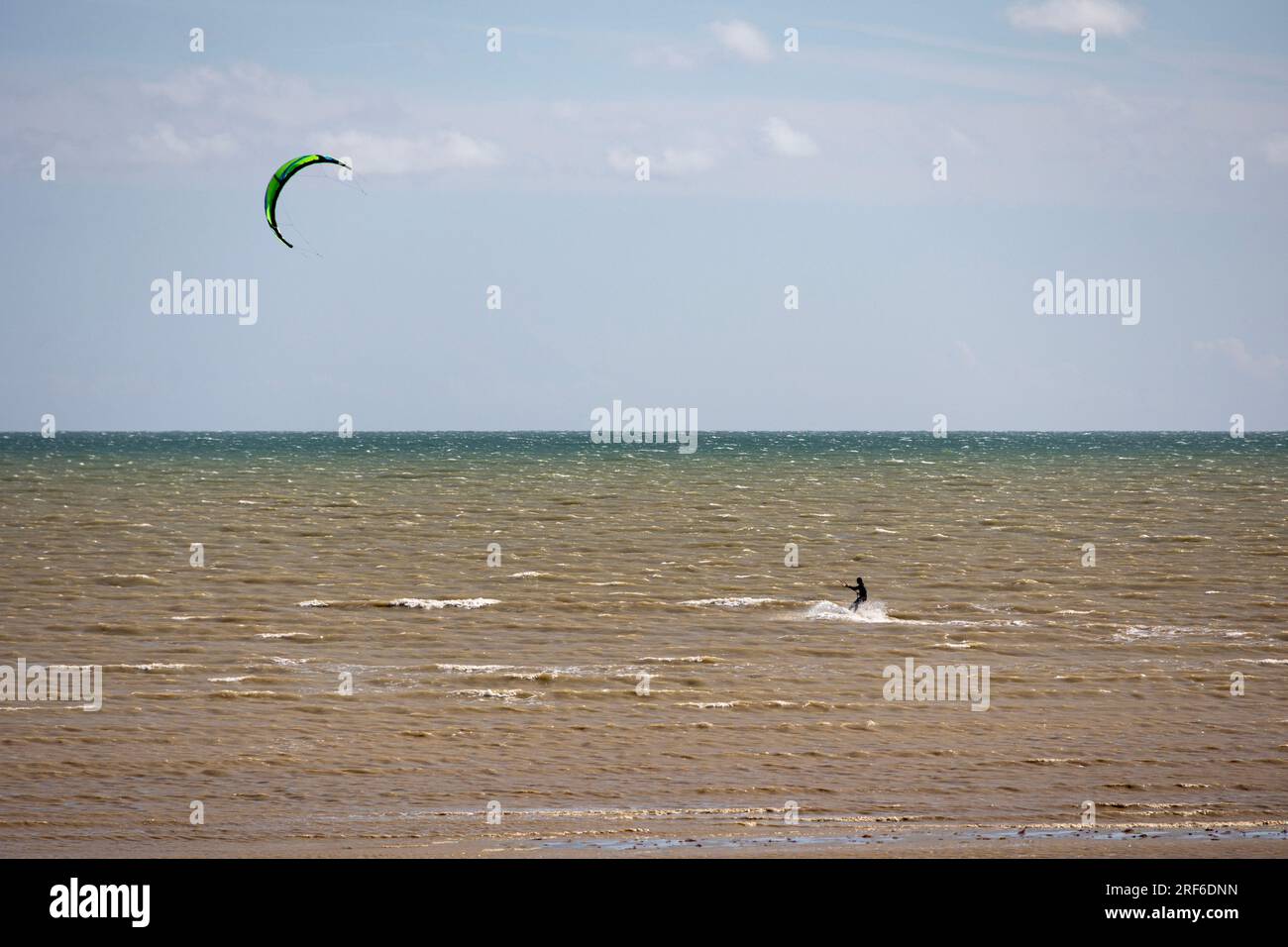 colour image of a kitesurfer off the coast of Worthing, West Sussex, UK Stock Photo