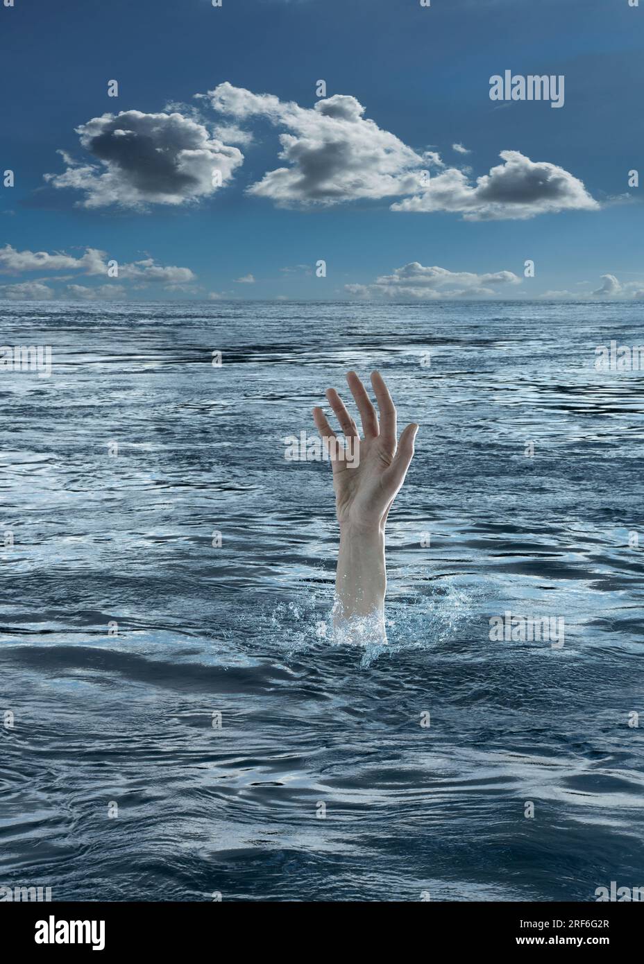 Reaching out hand in drowning emergency concept Stock Photo