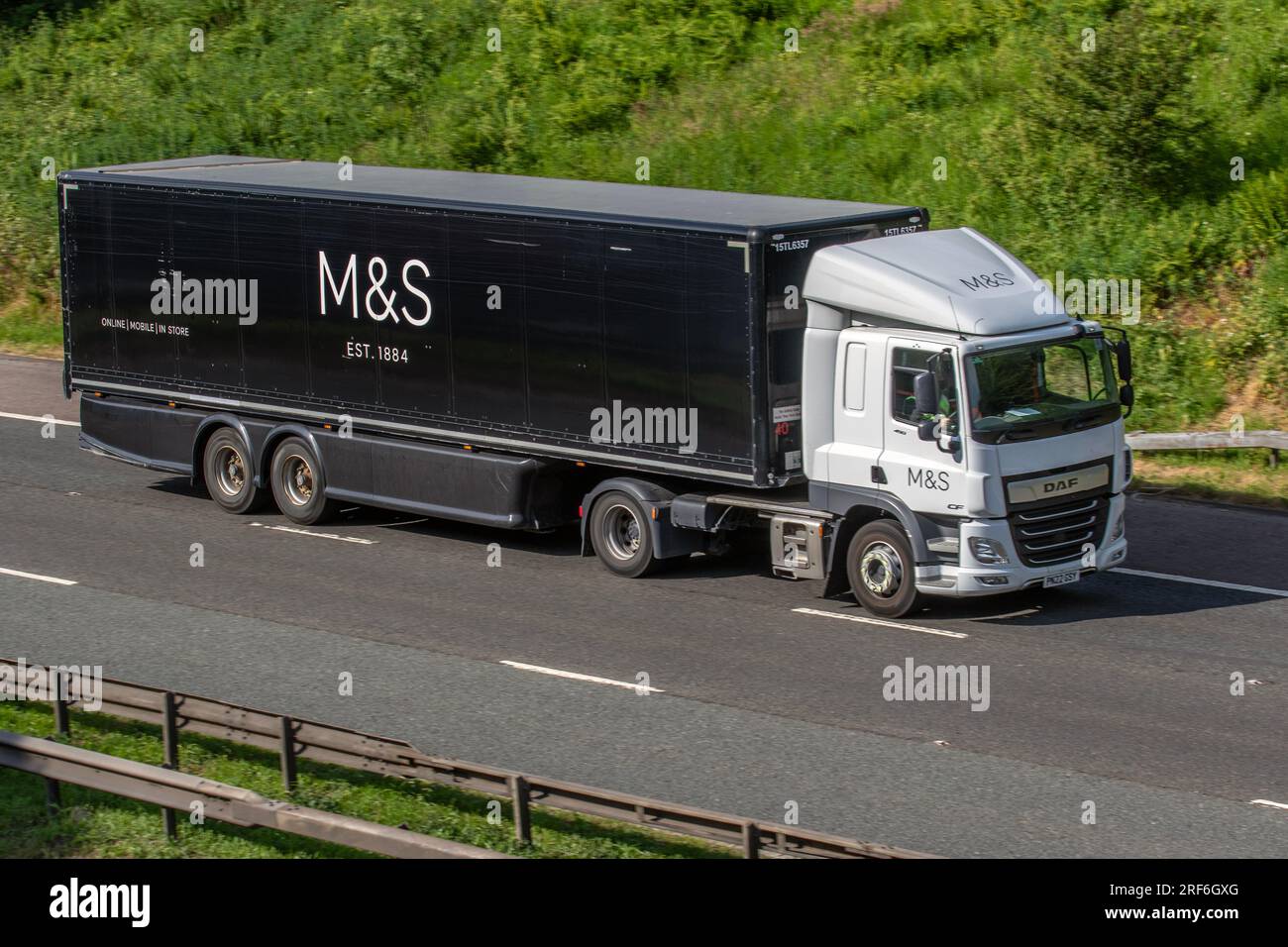 M&S, 'M&S'  Marks and Spencer, MS Supermarket DAF CF, delivery vehicle, 12902cc; travelling on the M6 Motorway, Manchester, UK Stock Photo