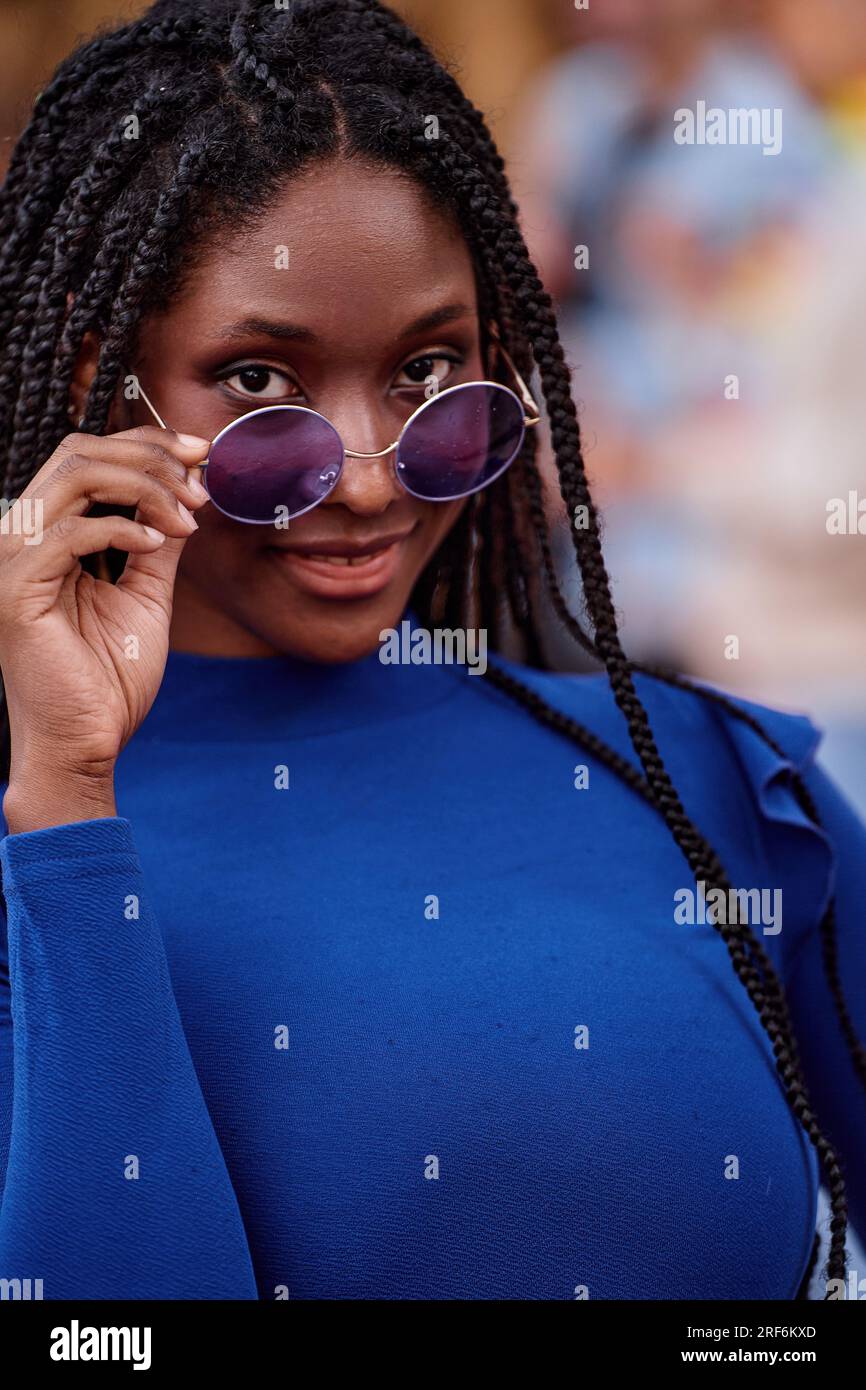 Portrait of beautiful african american woman with dreadlocks and ...