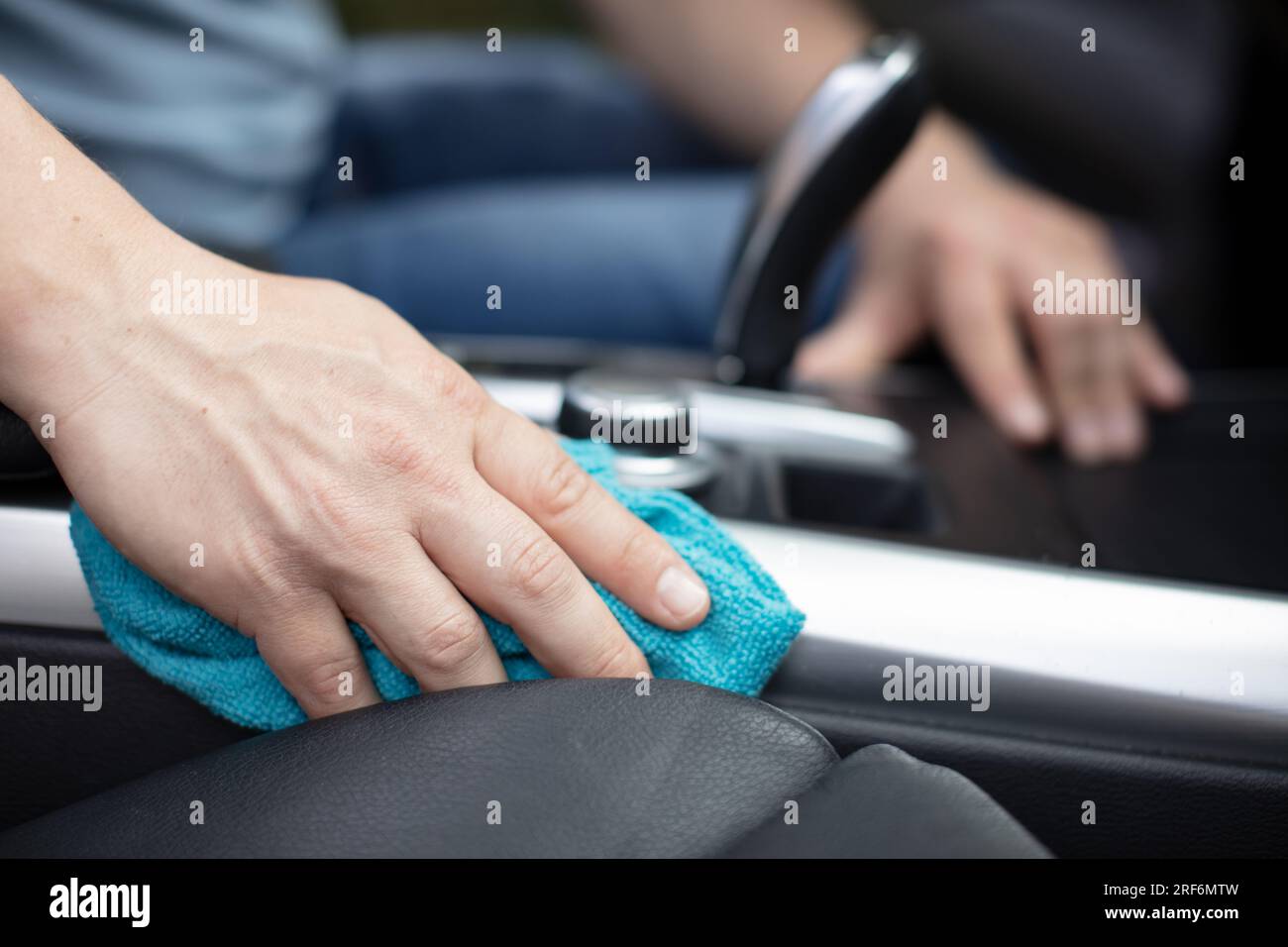 male cleaning inside the car Stock Photo Alamy