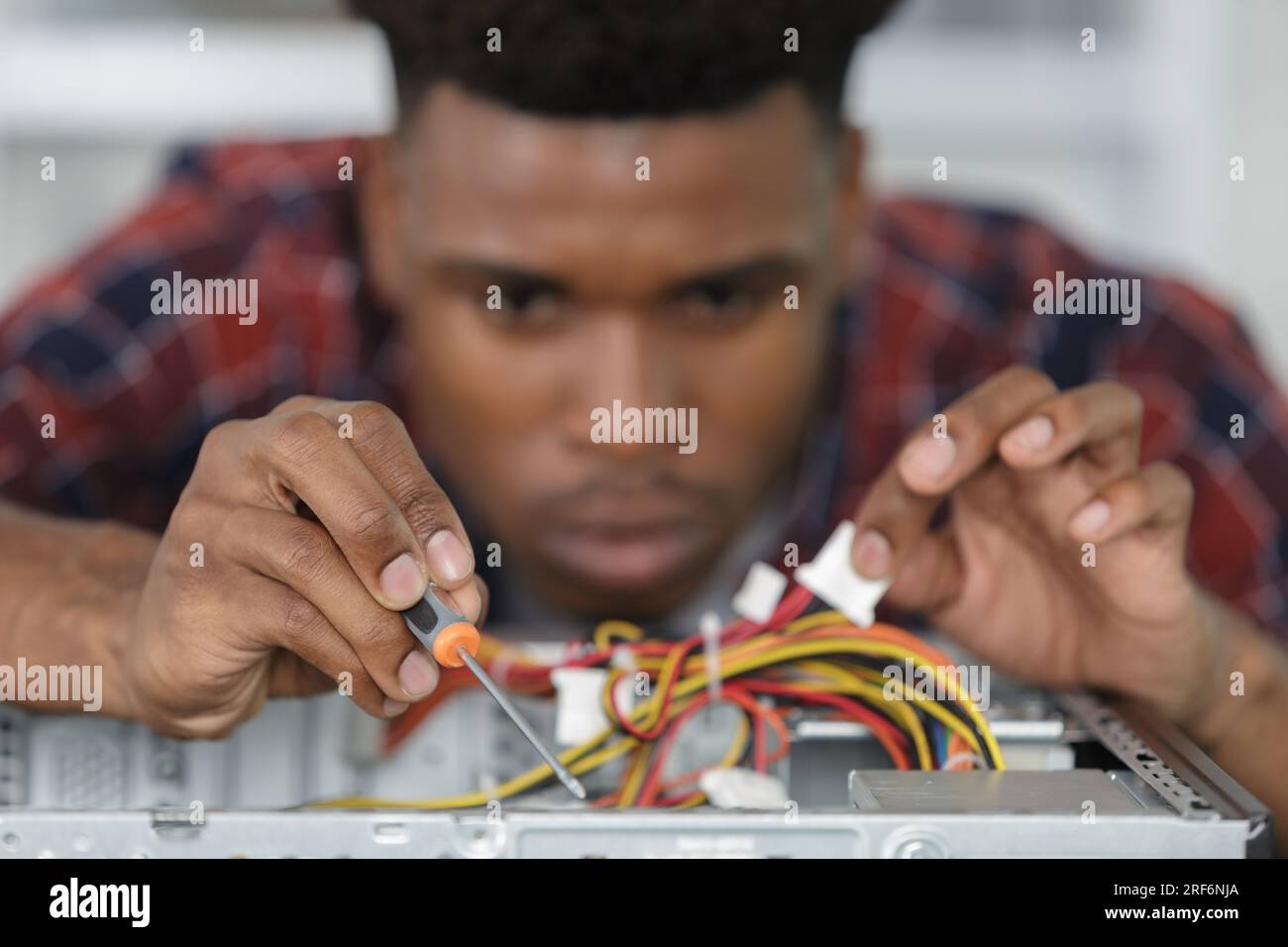 close view of precision work on dismantled computer Stock Photo