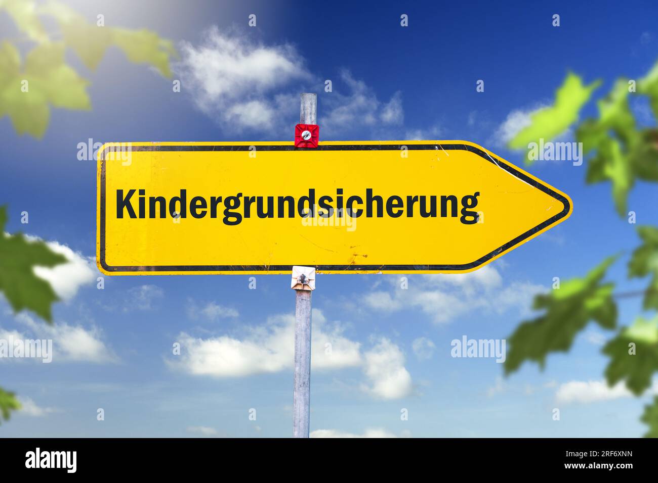 FOTOMONTAGE, Wegweiser Kindergrundsicherung Stock Photo