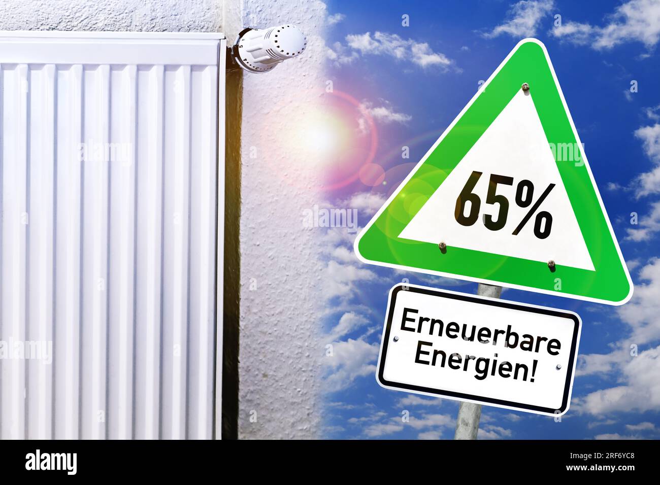 FOTOMONTAGE, Heizung und Schild mit Aufschrift 65% erneuerbare Energien Stock Photo