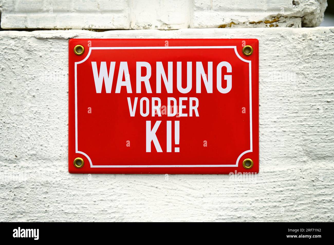 FOTOMONTAGE, Schild mit Aufschrift Warnung vor der KI Stock Photo