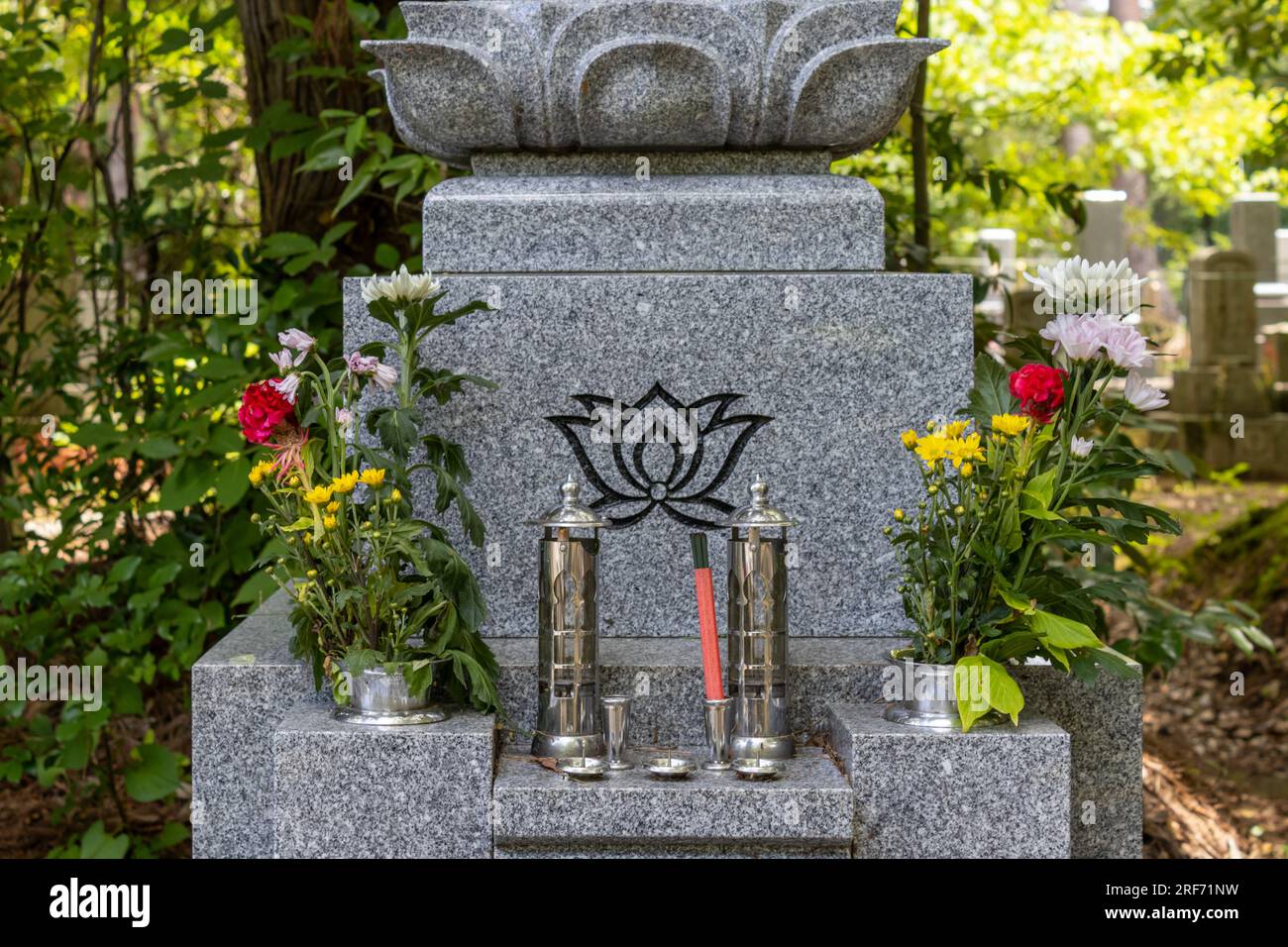 Grave in cemetery, Kanazawa, Japan, with incense sticks Stock Photo Alamy