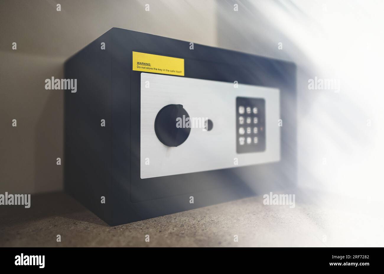 Black small home or hotel safe with keypad. Stock Photo