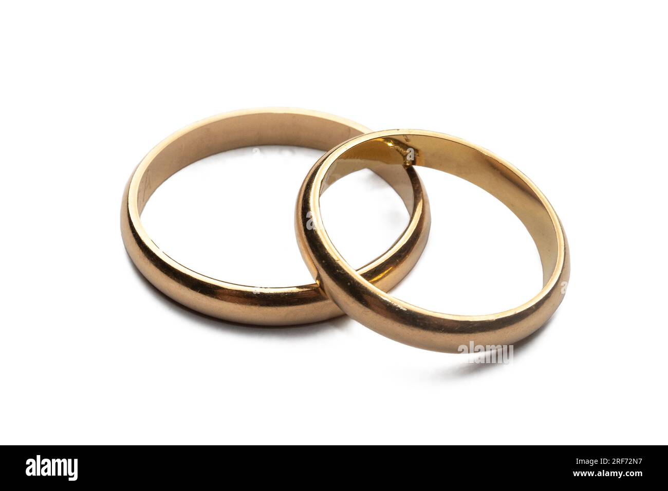 Gold wedding rings isolated on white background Stock Photo
