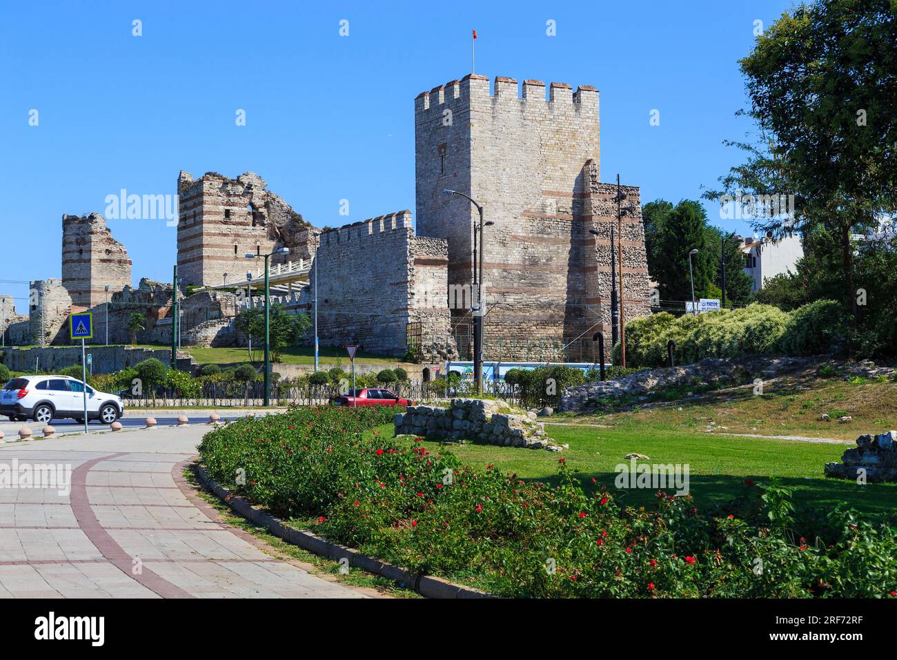 ISTANBUL, TURKEY - SEPTEMBER 14, 2017: These are the Byzantine fortress walls of Constantinople (Theodosian Walls) with a modern highway in their open Stock Photo
