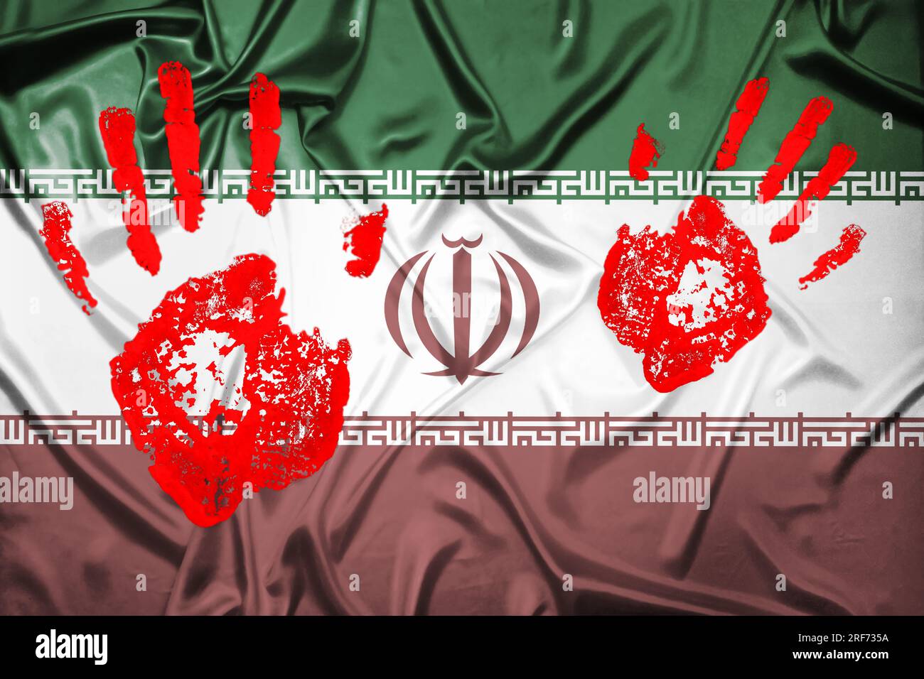 FOTOMONTAGE, Fahne des Iran mit blutigen Handabdrücken, Symbolfoto für die Menschenrechts-Proteste im Iran Stock Photo