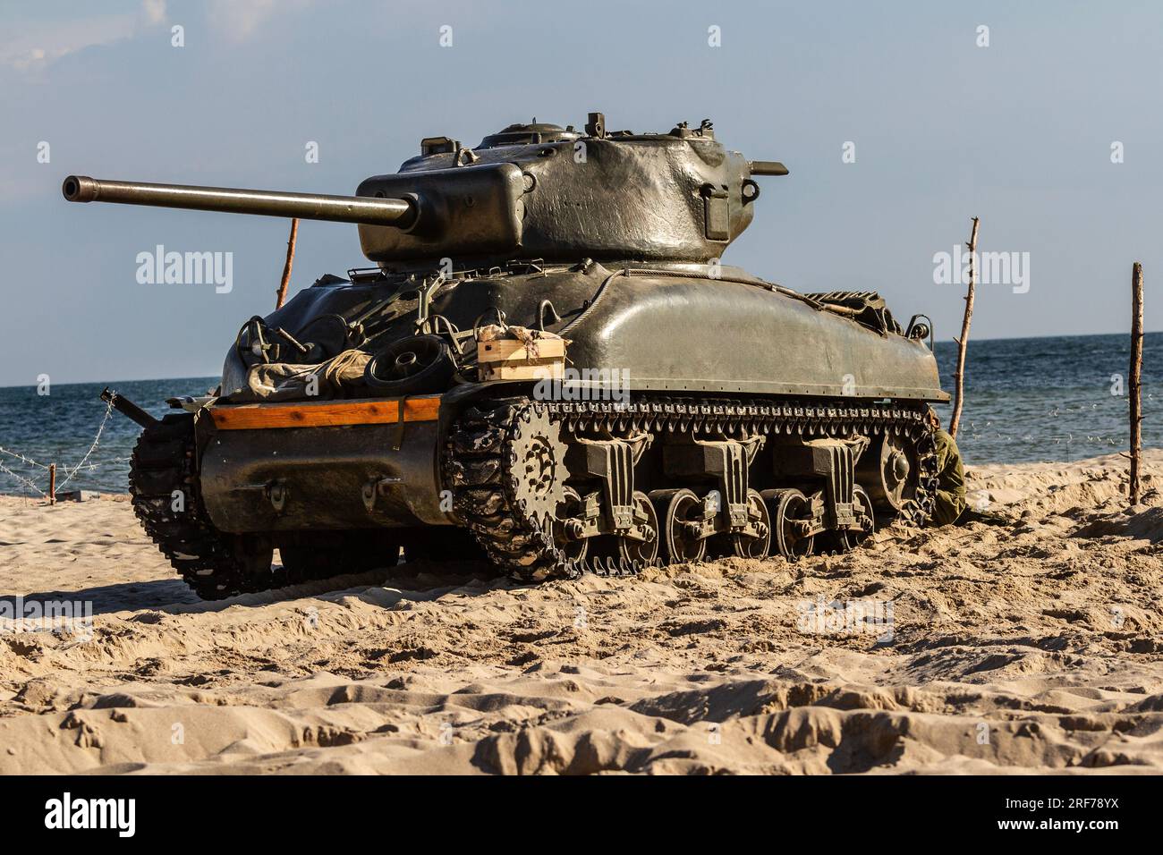 An American World War II Sherman tank on the beach. Stock Photo