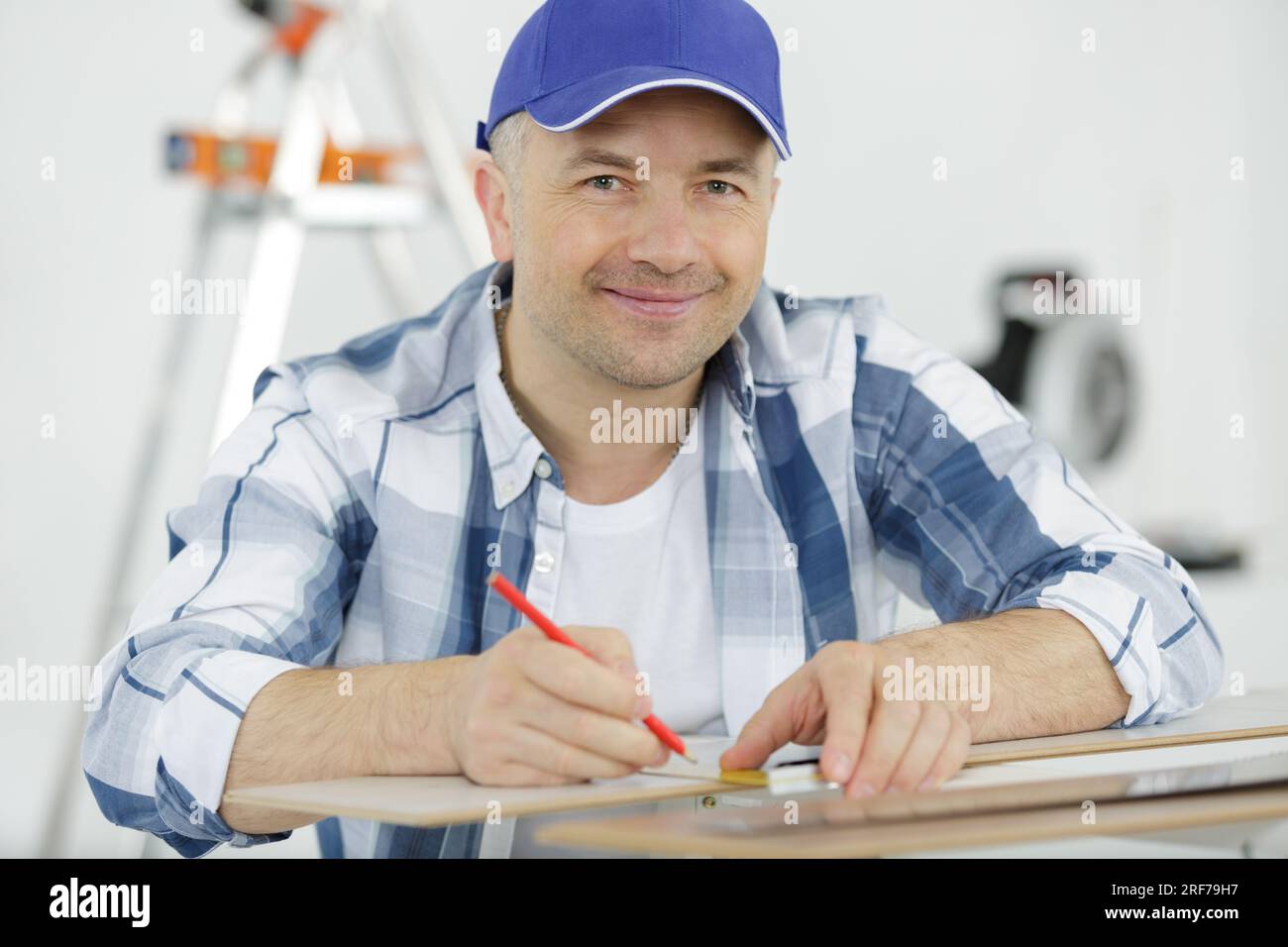 thoughtful man holding using his pencil Stock Photo